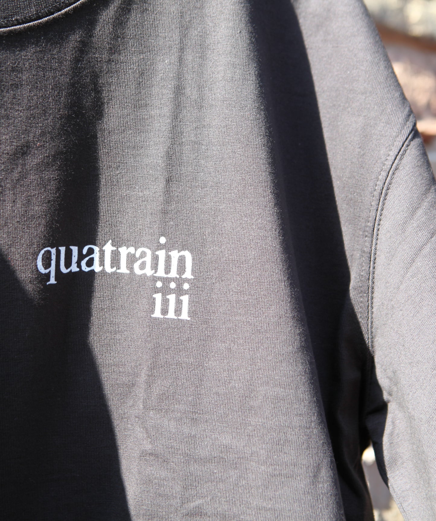 q iii T | Black